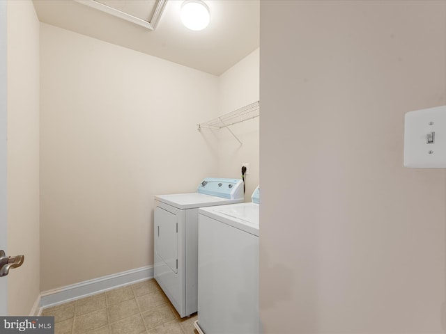 washroom featuring washer and dryer