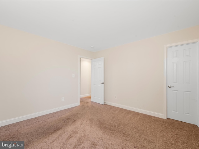 unfurnished bedroom with carpet flooring