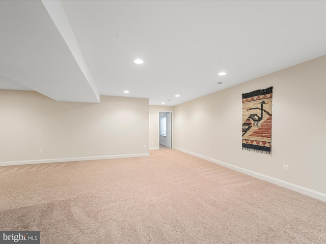 basement with light carpet