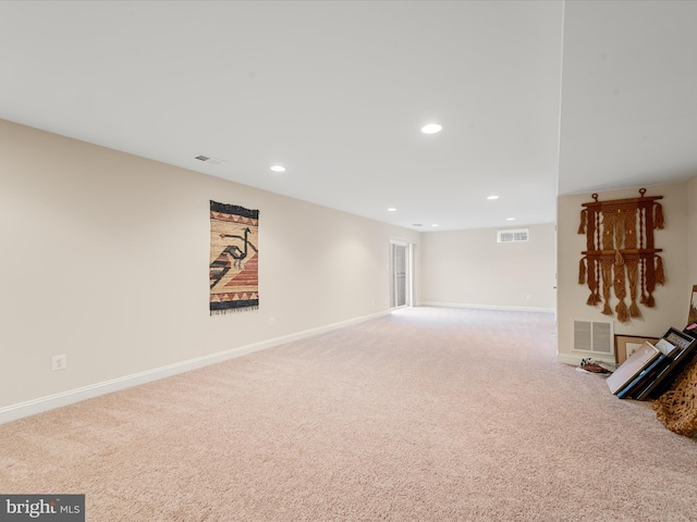 basement with carpet flooring