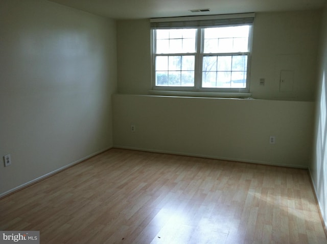 empty room featuring light hardwood / wood-style floors