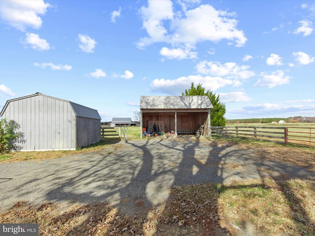 view of outdoor structure featuring a rural view