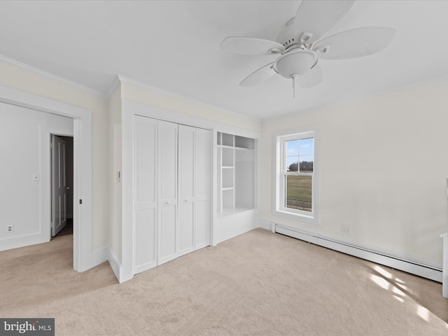 unfurnished bedroom with a baseboard radiator, ornamental molding, light colored carpet, and a closet