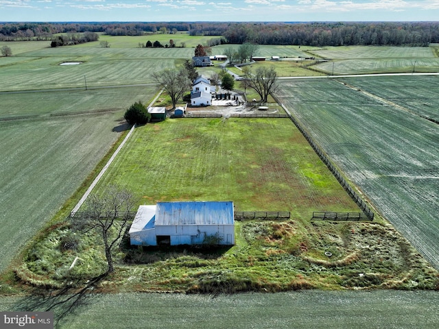 birds eye view of property with a rural view