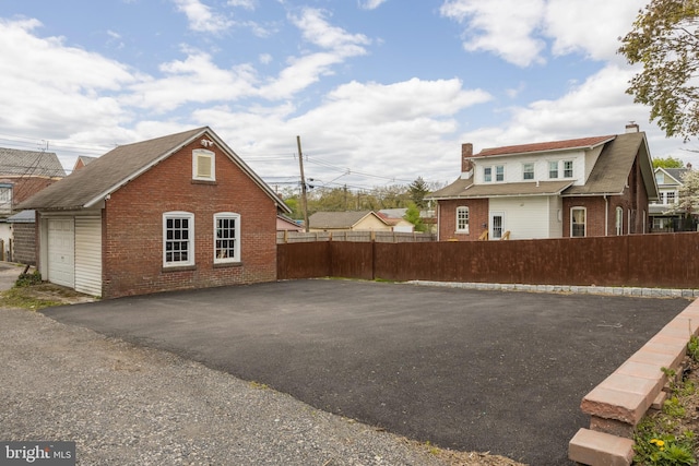 view of property exterior with a garage