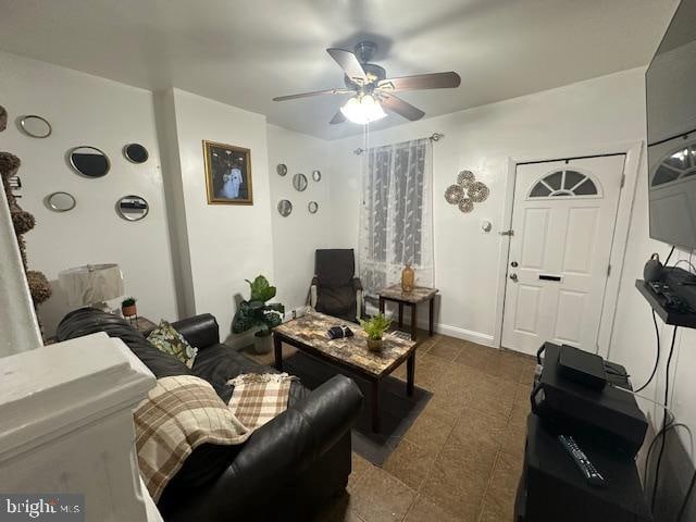 living room featuring ceiling fan