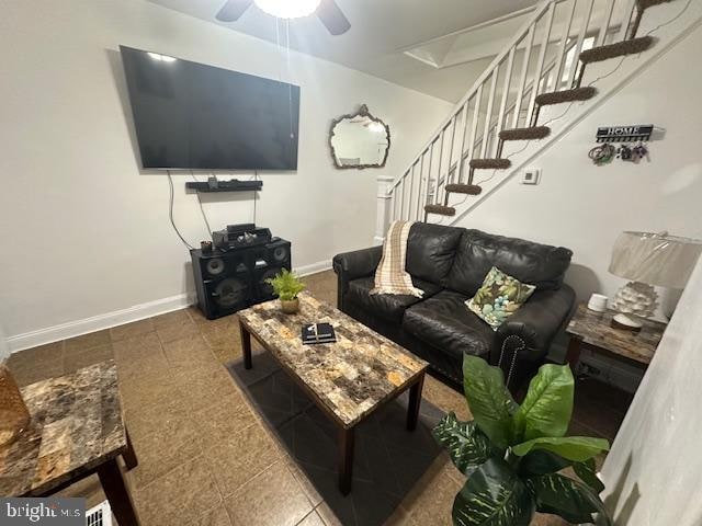 living room with ceiling fan