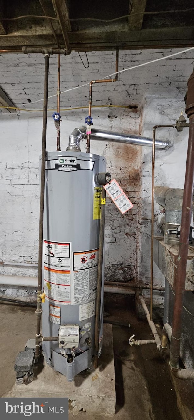 utility room with water heater