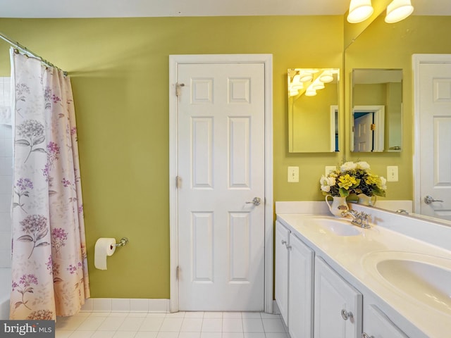 bathroom featuring tile patterned floors and vanity