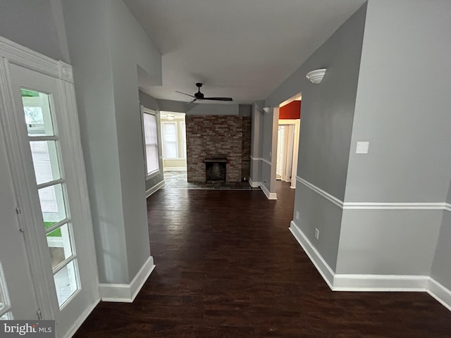 corridor featuring dark hardwood / wood-style floors