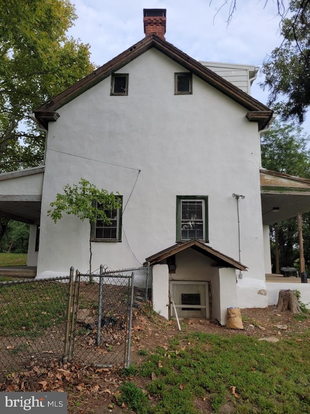 542 Auburn Rd, Landenberg, PA 19350 - view of side of property featuring stucco siding and a chimney