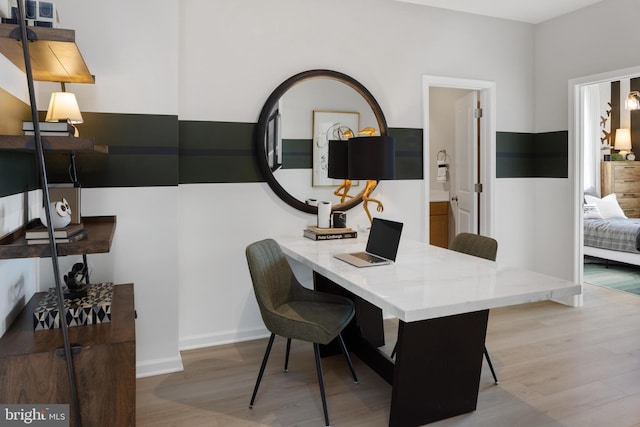 home office featuring light hardwood / wood-style floors