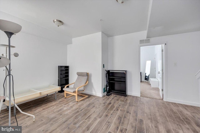 unfurnished room featuring light hardwood / wood-style floors