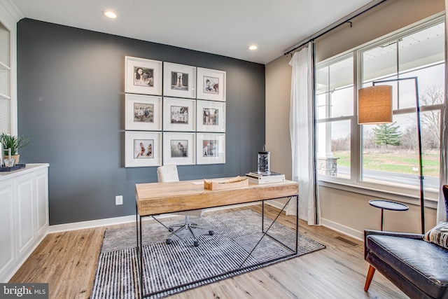 home office featuring light hardwood / wood-style flooring