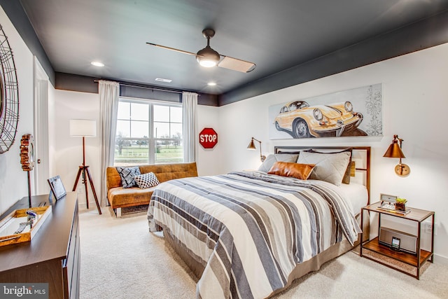 carpeted bedroom with ceiling fan