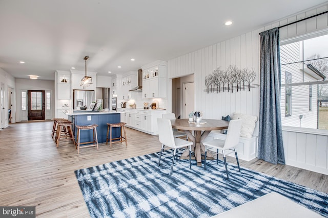 dining room featuring light hardwood / wood-style flooring