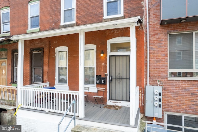 entrance to property with covered porch