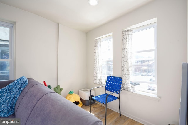 sitting room with hardwood / wood-style floors