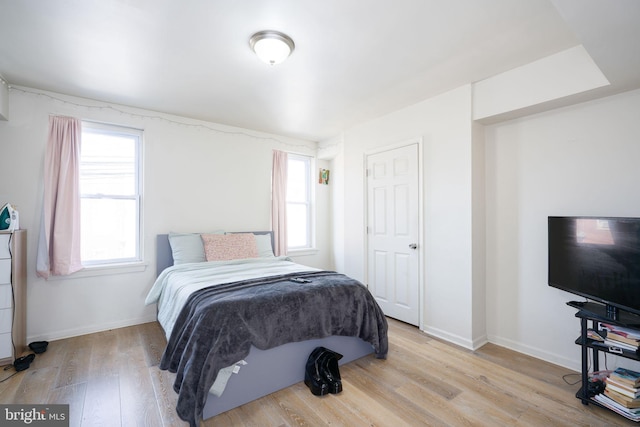 bedroom featuring light hardwood / wood-style floors