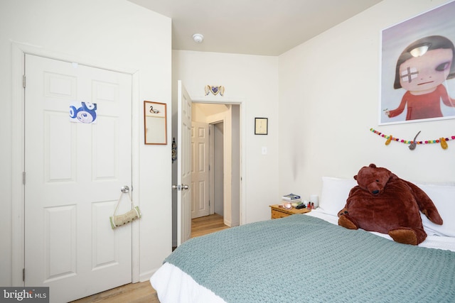 bedroom with light wood-type flooring