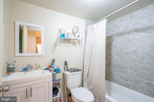 full bathroom with shower / bath combo with shower curtain, vanity, and toilet