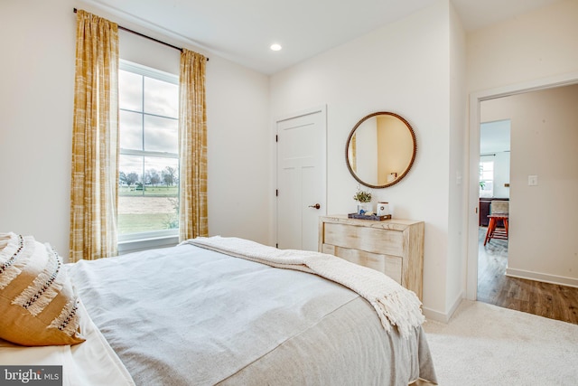 bedroom featuring hardwood / wood-style flooring