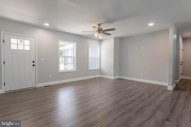 foyer entrance featuring ceiling fan and dark hardwood / wood-style flooring