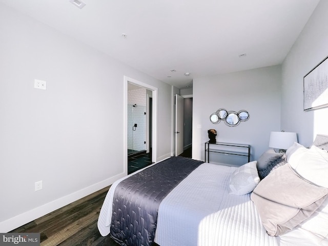 bedroom featuring dark wood-type flooring