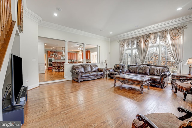 15280 Riding Club Dr, Haymarket, VA 20169 - living area with decorative columns, ornamental molding, light wood-style flooring, and recessed lighting