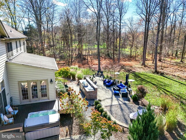 15280 Riding Club Dr, Haymarket, VA 20169 - view of yard with an outdoor living space with a fire pit, a patio, and view of scattered trees