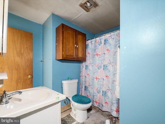 376 Lamonte, Harpers Ferry, WV 25425 - full bath featuring toilet, vanity, curtained shower, and tile patterned floors