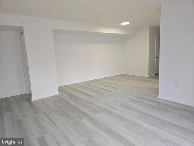 unfurnished room with light hardwood / wood-style floors