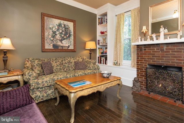 living room featuring dark hardwood / wood-style flooring, a brick fireplace, and crown molding