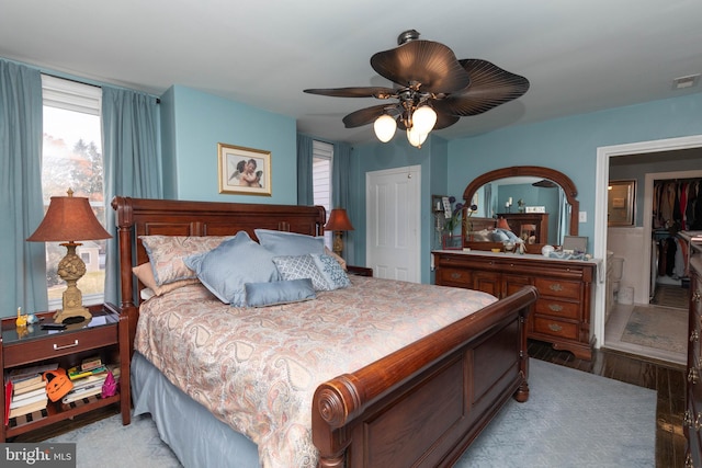 bedroom featuring ceiling fan and light hardwood / wood-style floors