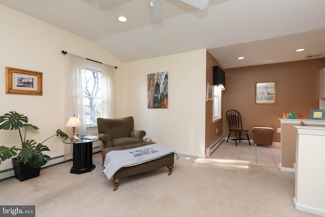 living area with baseboard heating, light carpet, ceiling fan, and lofted ceiling