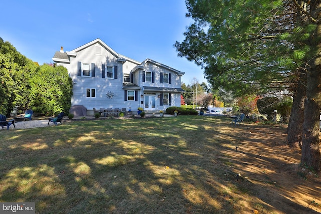 view of front of home with a front lawn