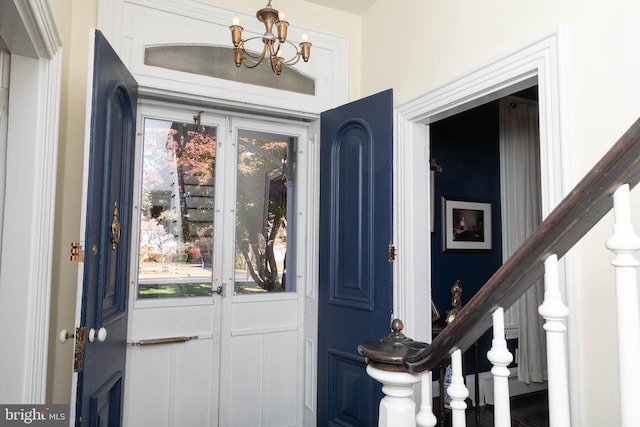 entrance foyer with an inviting chandelier