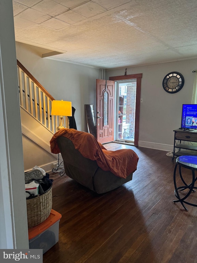 533 Hamilton St, Lancaster, PA 17602 - living area with hardwood / wood-style floors, a textured ceiling, stairway, and baseboards