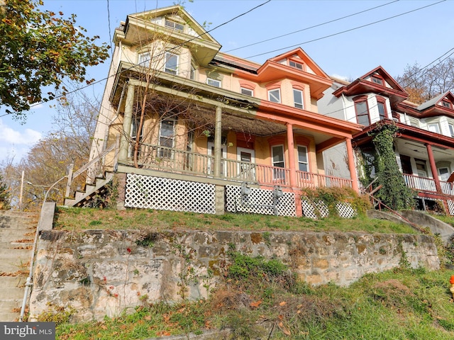 view of front of home featuring covered porch