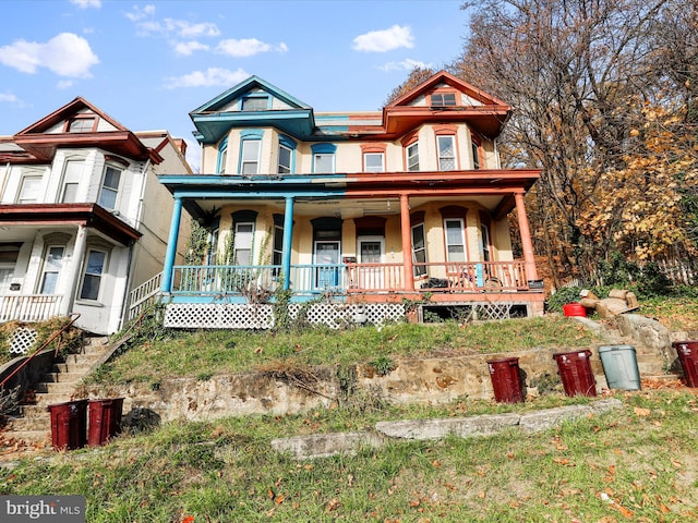 victorian-style house with covered porch