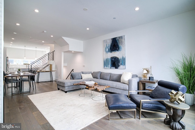 living room with dark wood-type flooring