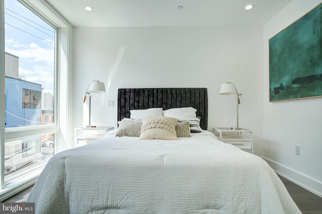 bedroom with hardwood / wood-style flooring