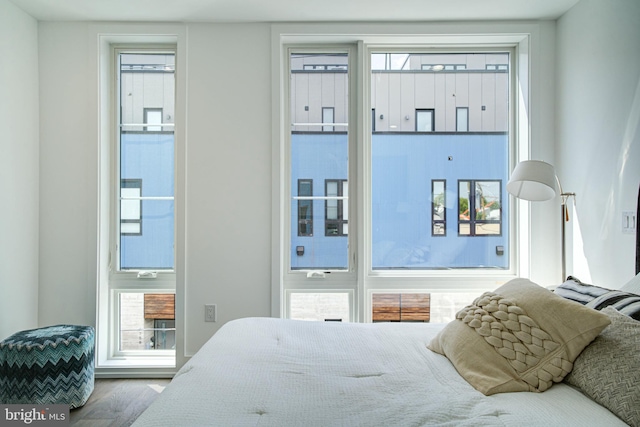 bedroom with hardwood / wood-style flooring