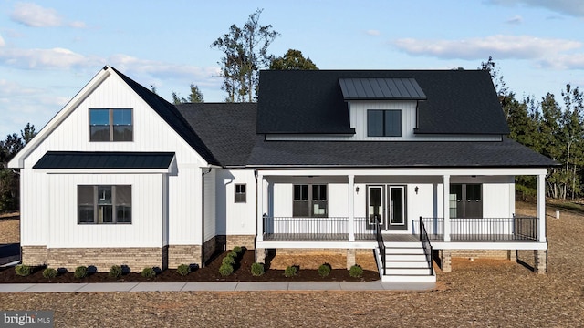 modern farmhouse featuring a porch