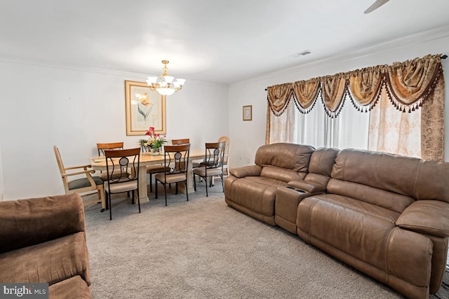 living room featuring carpet flooring, crown molding, and an inviting chandelier