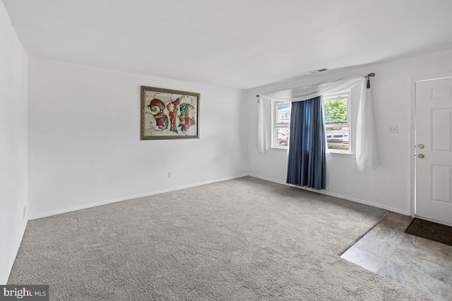 unfurnished room with carpet