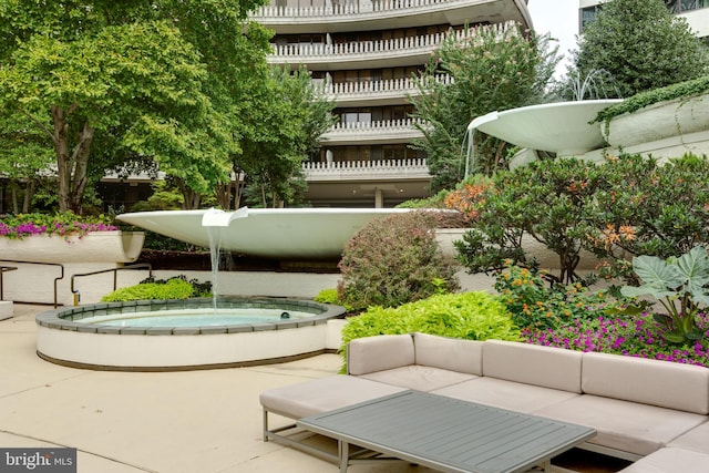 view of community featuring a jacuzzi