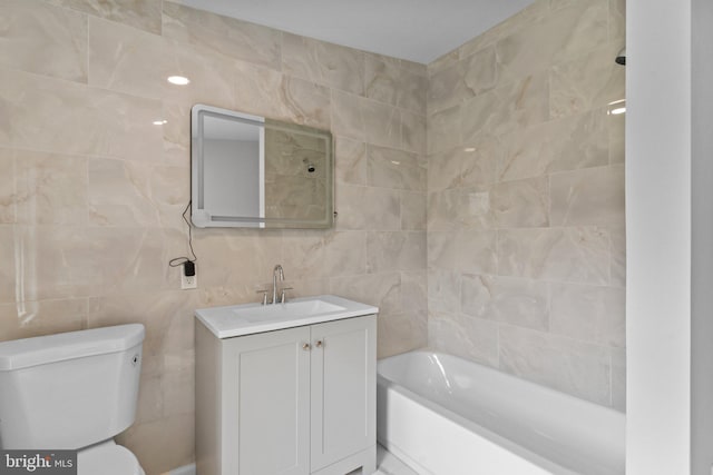 full bathroom with vanity, toilet, shower / tub combination, and tile walls