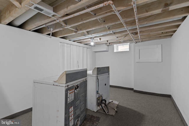 basement with dark colored carpet