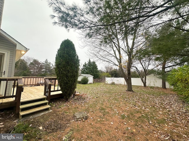 view of yard featuring a deck